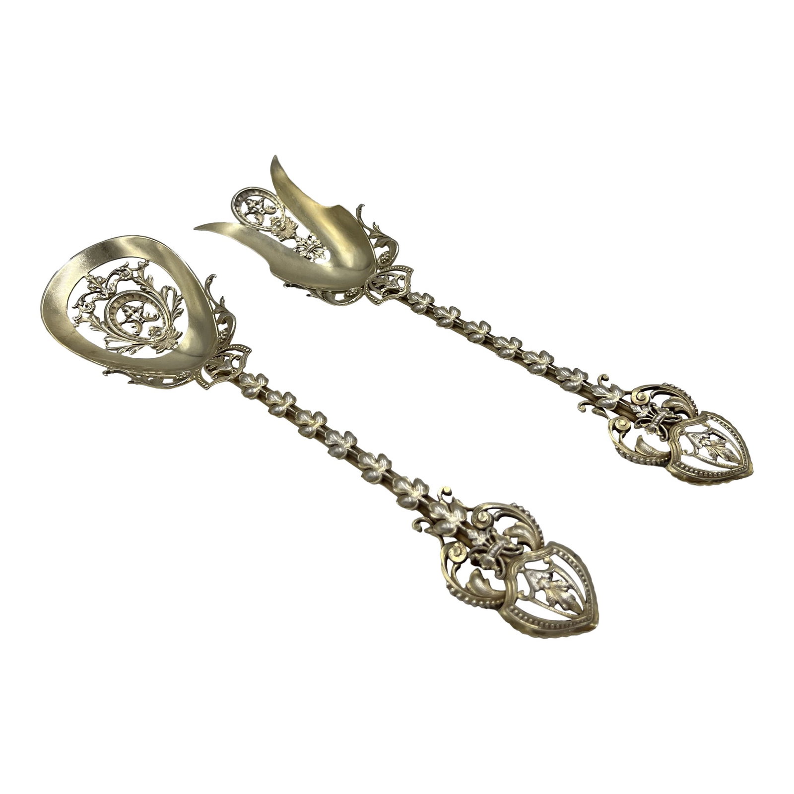 Pair, George Shiebler Ornate Floral and Vine Sterling Silver Pierced Salad Set: Ornate sterling light goldwash serveware set. Includes a pierced serving fork together with a serving spoon featuring fantastic flower and vine scrolled embellishment. Each marked for maker, sterling