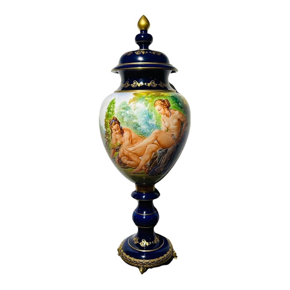 Large Scale Italian Capodimonte Porcelain "Two Nude Graces" Lidden Urn: Capodimonte, 20th century. A large scale porcelain lidded urn depicting two nude graces. Marked to underside. Approx: 14" W X 14" D X 40" H. Please note: This item is located in Atlanta, GA
