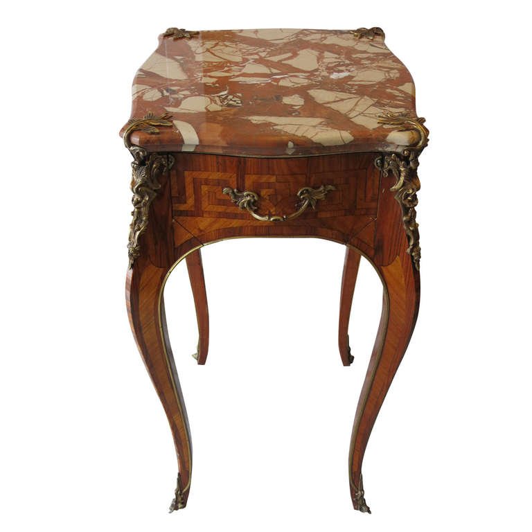 FRENCH: Bronze Moutned Marquetry Nightstand: French Bronze Moutned Marquetry Nightstand with Marble top, late 20th Century 20" x 17.5 x 30.5 hPROVENANCE: Rittenhouse Square Apartment, Phila PA
