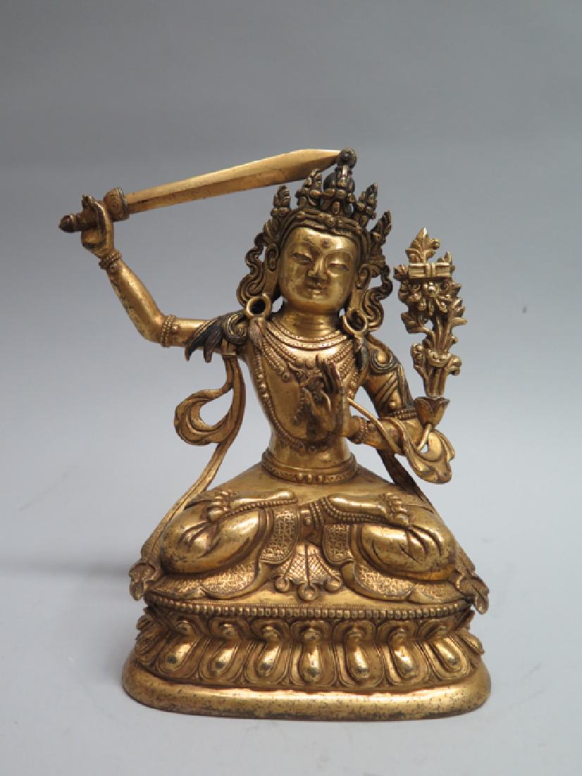 A gilt bronze figure of Manjushri (1 of 14)