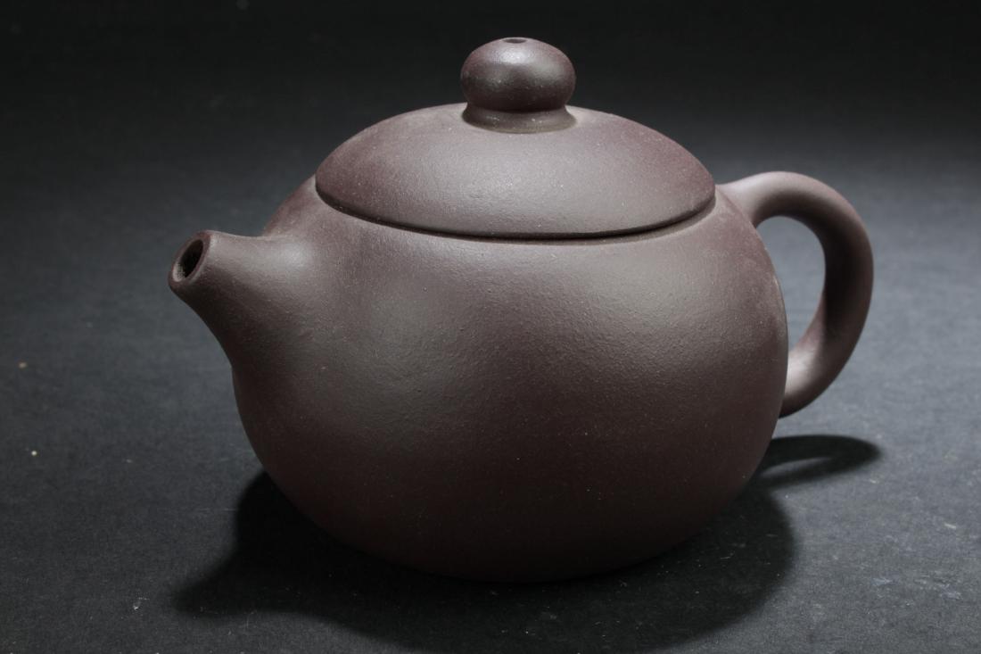 A Circular Chinese Fortune Tea Pot Display (1 of 7)