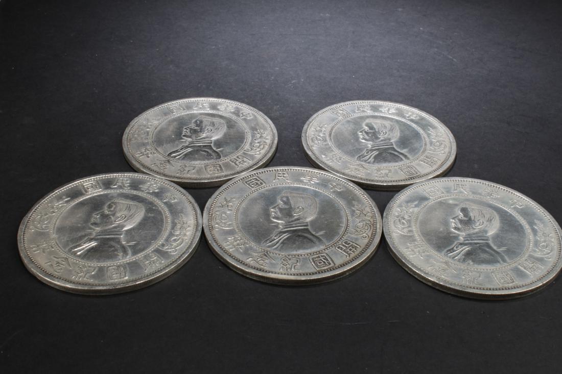 A Pile of Chinese Fortune Coin Displays (1 of 9)