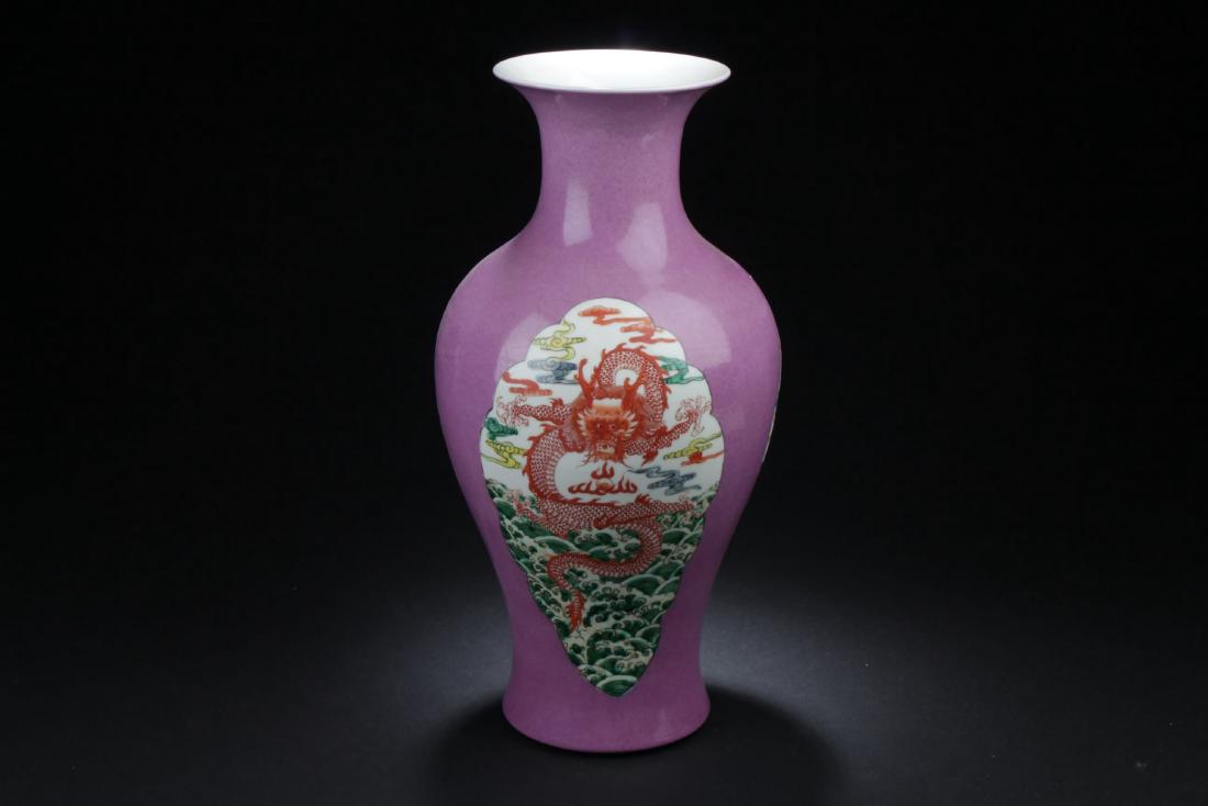 A Windowed Chinese Porcelain Dragon-decorating Vase: A Windowed Chinese Porcelain Dragon-decorating Vase. Height: 16 (inch).