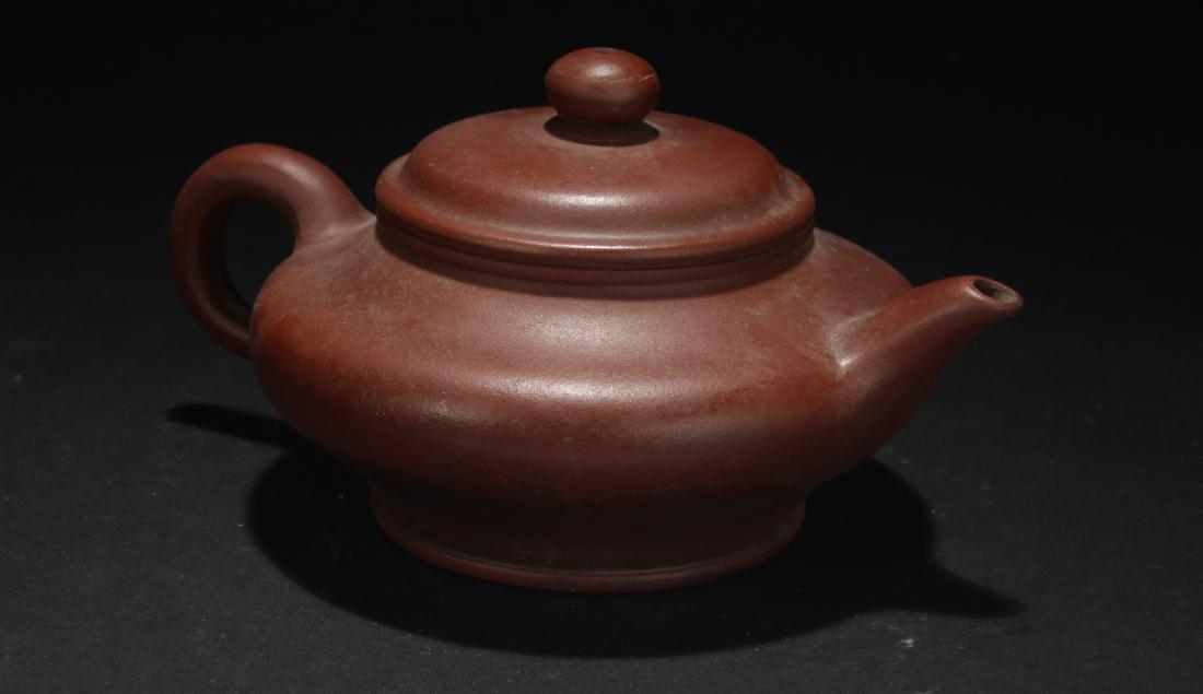 A Chinese Circular Estate Tea Pot Display (1 of 5)