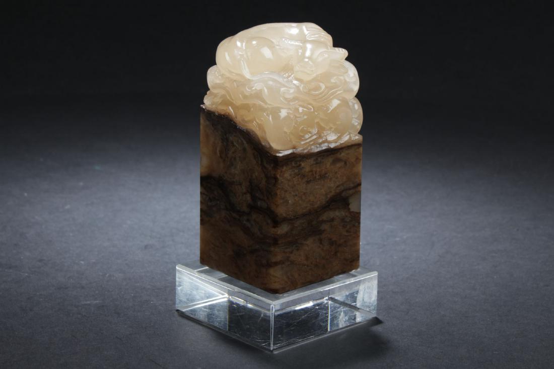 An Estate Chinese Soapstone Myth-beast Uncurved Seal: An Estate Chinese Soapstone Myth-beast Uncurved Seal . Dimension: 2 x 2 x 4 (inch).