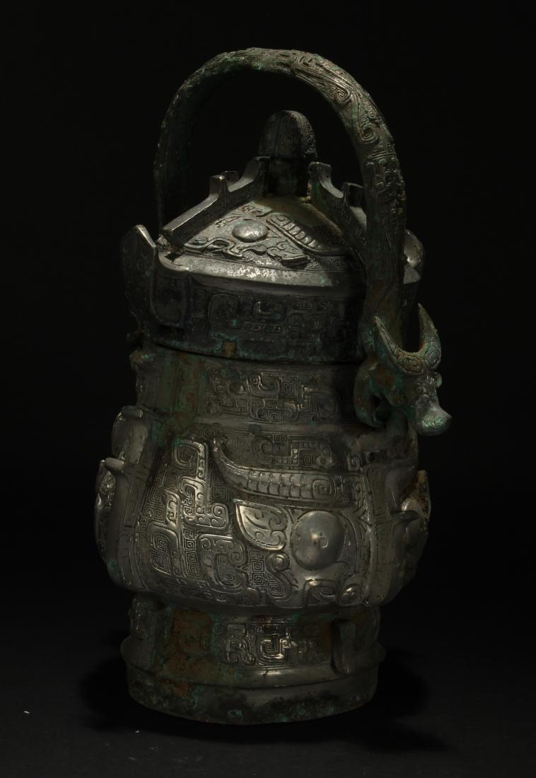 An Anicent-framing Chinese Estate Handled Bronze Vessel (1 of 7)