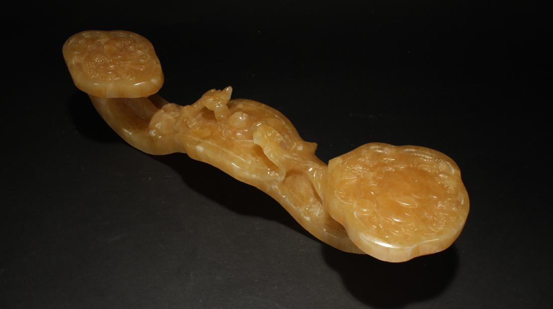 A Chinese Yellow Jade-curving Ryui Display (1 of 5)