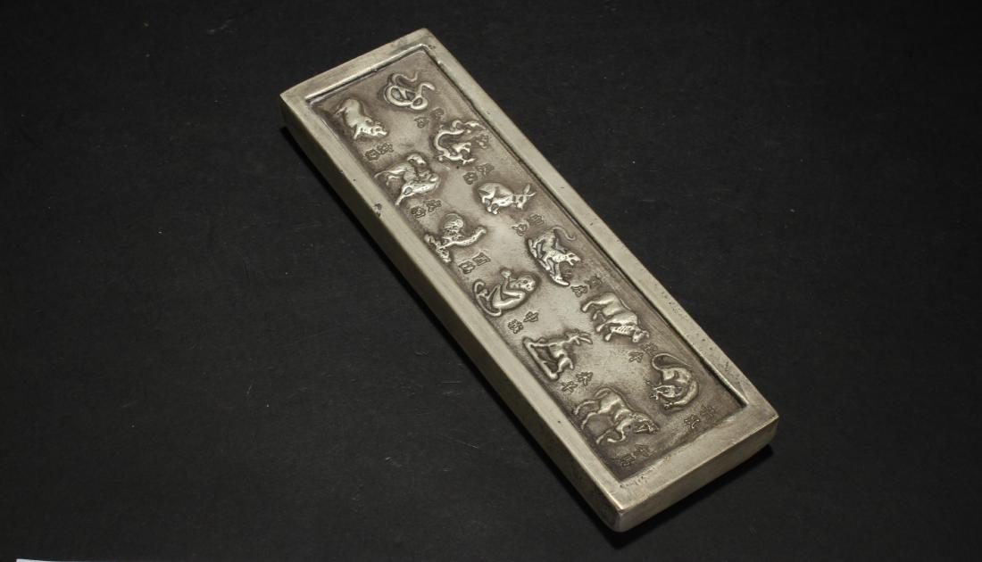 A Chinese Twelve-animal Fortune Money Brick Display: A Chinese Twelve-animal Fortune Money Brick Display . Height: 0.25 (inch). Length: 7 (inch). Width: 2.25 (inch).