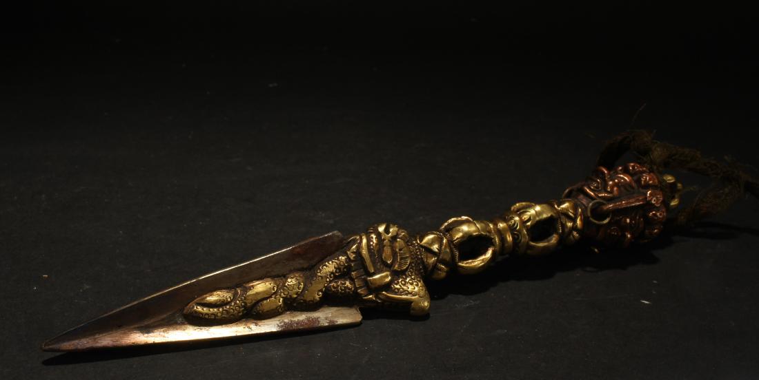 A Tibetan Gilt Estate Religious Dagger Display (1 of 5)