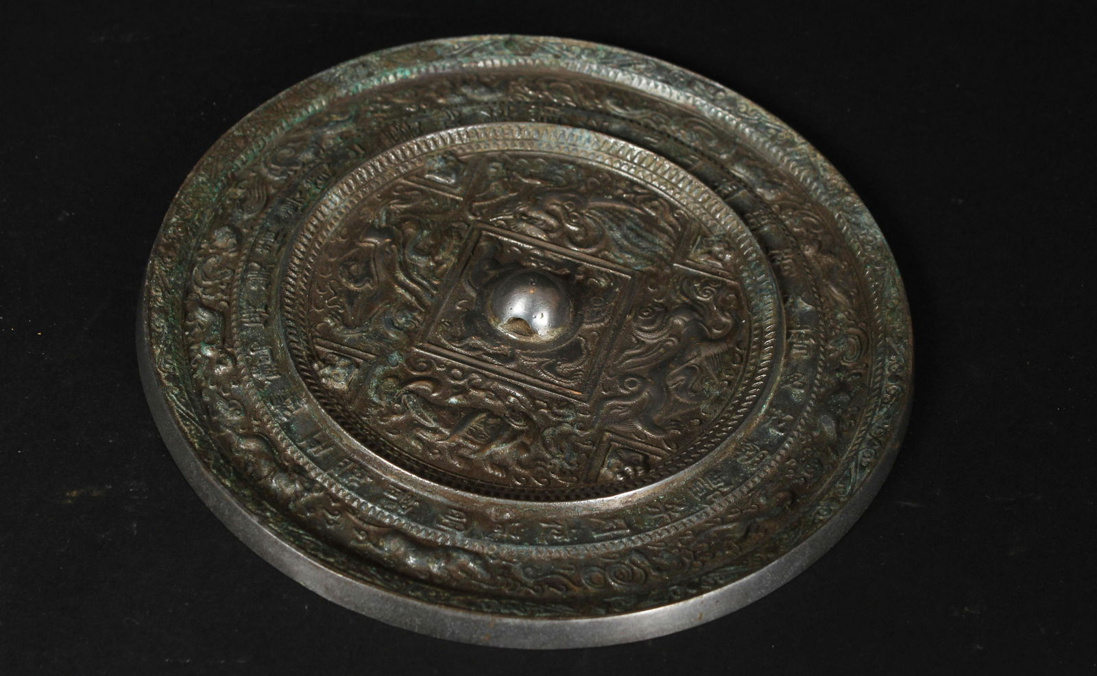 A Chinese Myth-beast Estate Bronze Mirror (1 of 5)