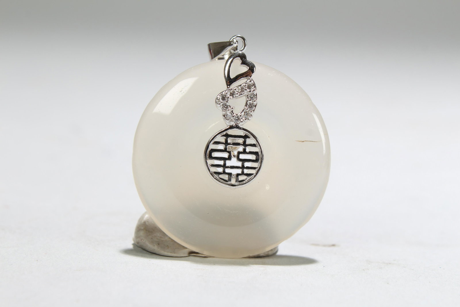 An Estate Chinese Jade Figure: An Estate Chinese Jade Figure. Opening Diameter: 1.1 (inch).