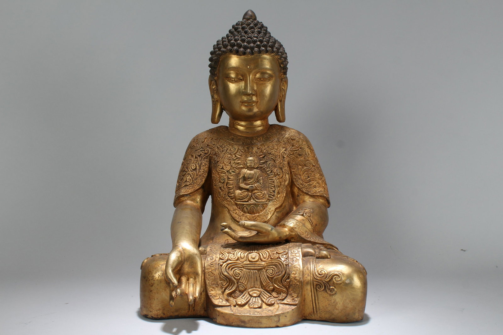 An Estate Chinese Gilt Massive Buddha Statue: An Estate Chinese Gilt Massive Buddha Statue . Height: 16.25 (inch).