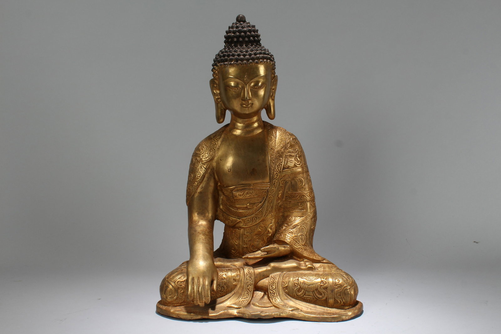 An Estate Chinese Gilt Massive Buddha Statue: An Estate Chinese Gilt Massive Buddha Statue . Height: 15.5 (inch).