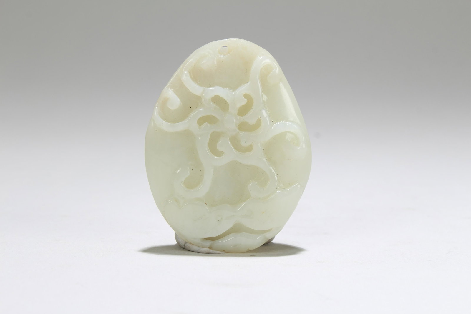 An Estate Chinese Jade-curving Figure: An Estate Chinese Jade-curving Figure. Length: 2 (inch). Width: 1.5 (inch).