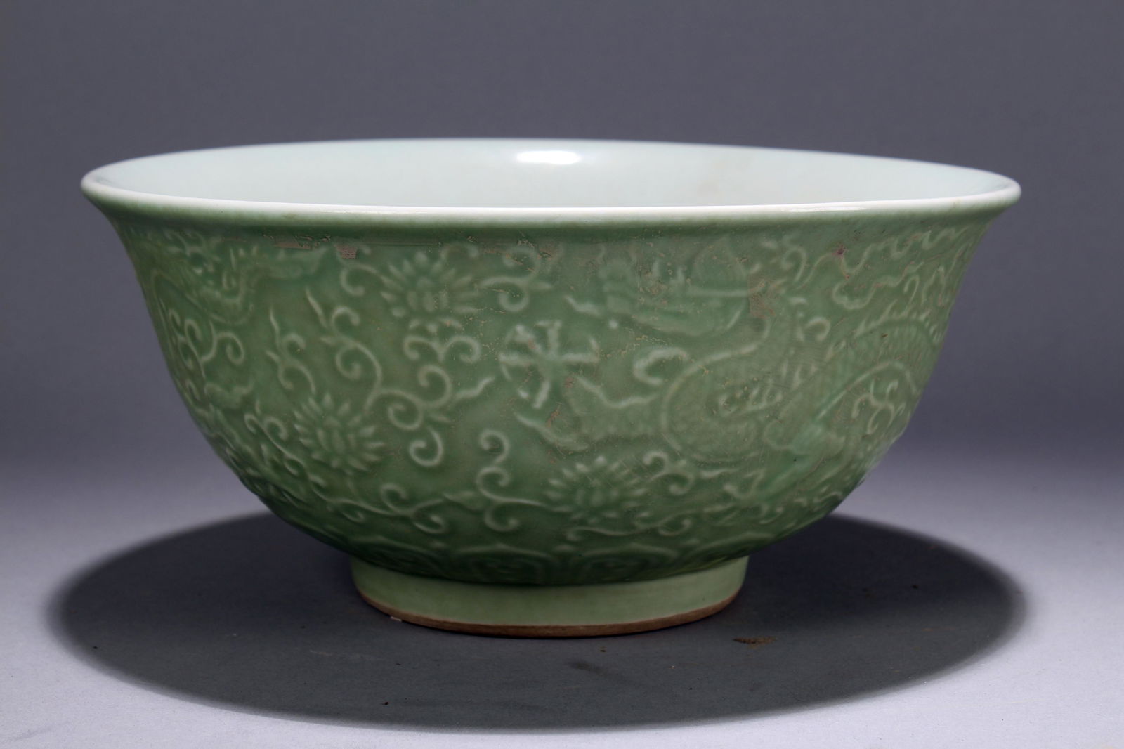 A Chinese Circular Dragon-decorating Estate Porcelain (1 of 6)