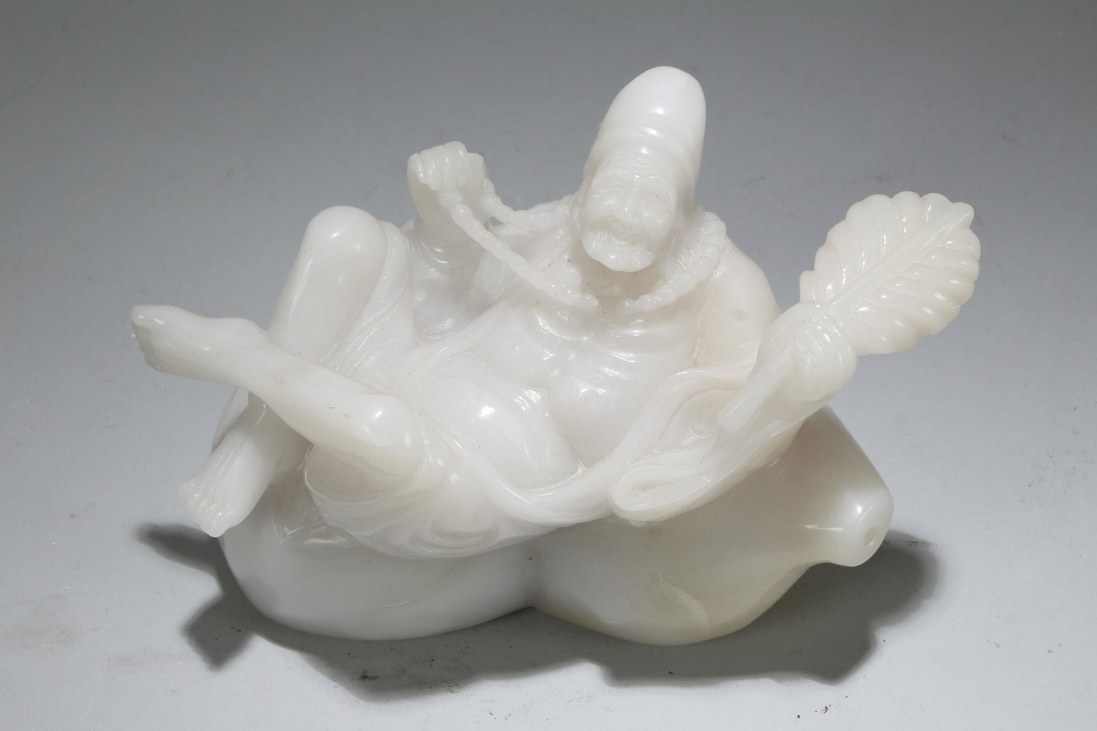 An Estate Chinese Jade-curving Religious Buddha Statue: An Estate Chinese Jade-curving Religious Buddha Statue . Height: 5 (inch). Length: 7.5 (inch). Width: 7.25 (inch).
