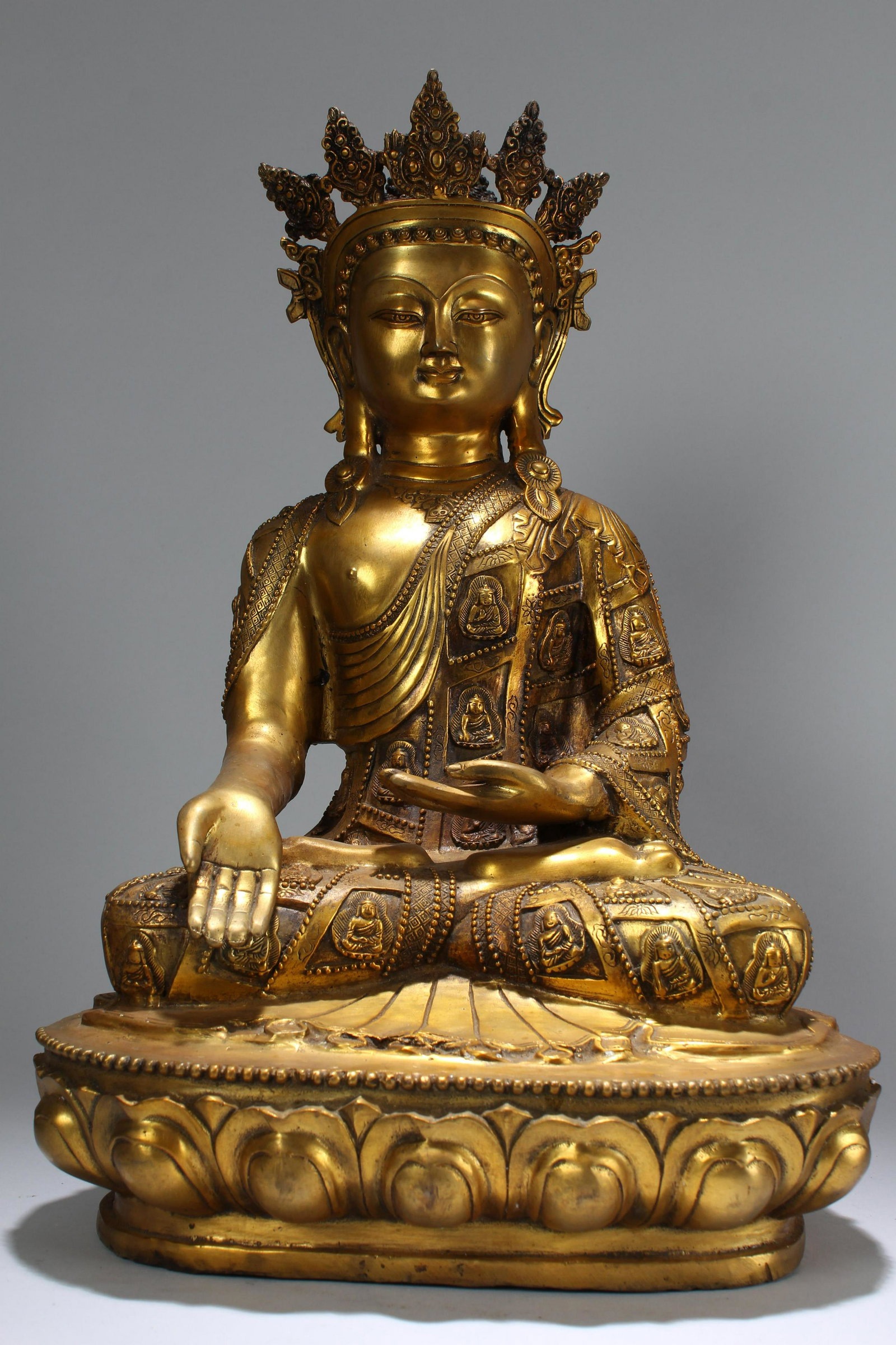 An Estate Chinese Gilt Lotus-seated Massive Buddha: An Estate Chinese Gilt Lotus-seated Massive Buddha Statue . Height: 7.75 (inch).