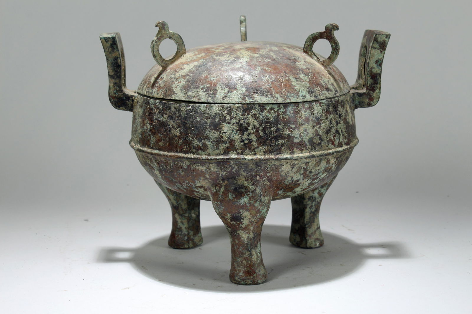 An Estate Chinese Lidded Tri-podded Duo-handled Bronze (1 of 6)