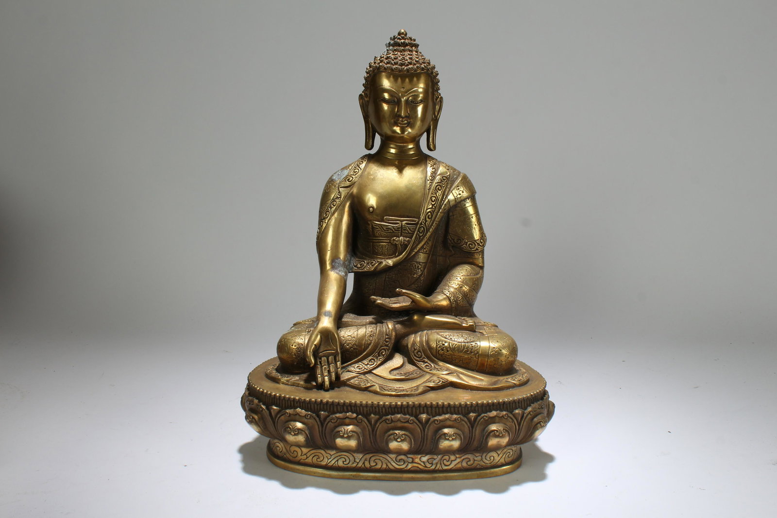 A Chinese Lotus-seated Massive Buddha Statue: A Chinese Lotus-seated Massive Buddha Statue . Height: 12 (inch).