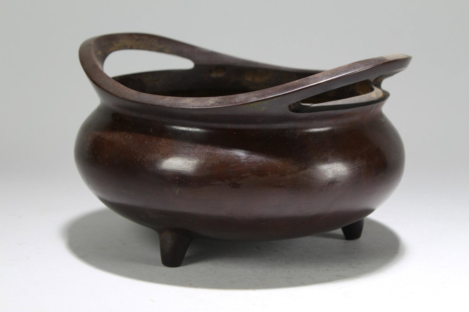 A Chinese Bent-fortune Circular Tri-podded Fortune: A Chinese Bent-fortune Circular Tri-podded Fortune Censer . Height: 4.25 (inch). Opening Diameter: 7 (inch).