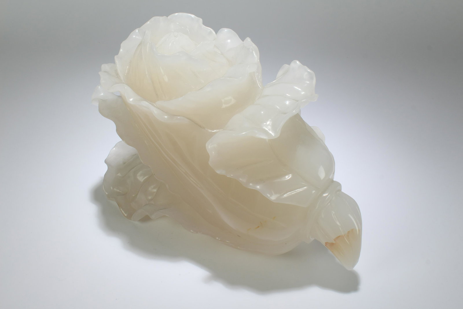 A Chinese Jade-curving CAB bage Statue: A Chinese Jade-curving CAB bage Statue . Height: 8.5 (inch). Length: 12 (inch).
