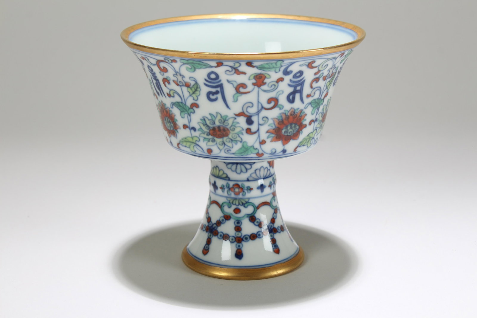 A Chinese Fortune Bat-framing Porcelain Tall-end Cup: A Chinese Fortune Bat-framing Porcelain Tall-end Cup. Height: 4 (inch). Width: 4 (inch).
