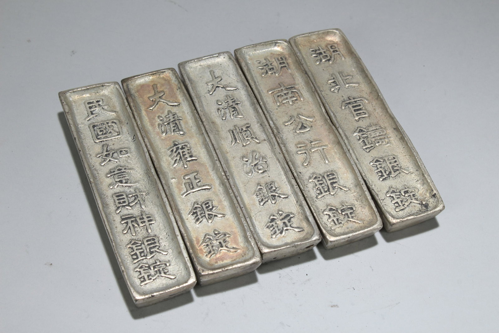 Collection of Chinese Money Bricks: Collection of Chinese Money Bricks. Height: 0.25 (inch). Length: 4.25 (inch). Width: 1 (inch).