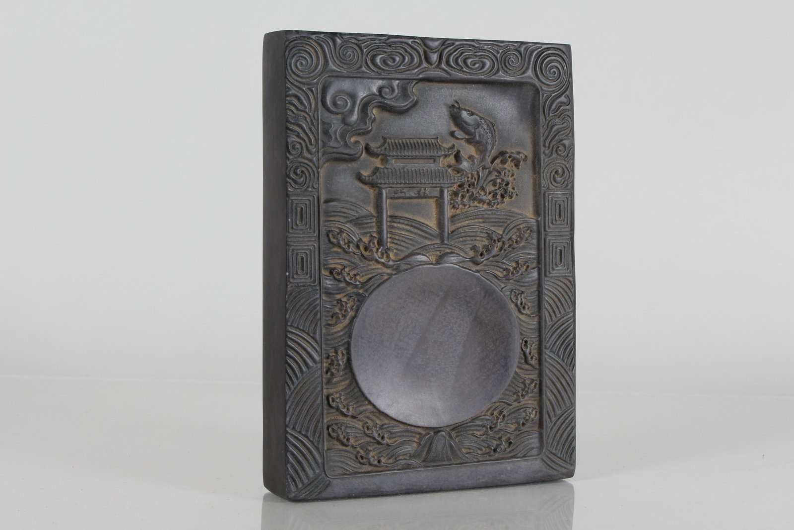 A Chinese Temple-view Fortune Inkstone: A Chinese Temple-view Fortune Inkstone. Height: 1 (inch). Length: 7.5 (inch). Width: 5.5 (inch).