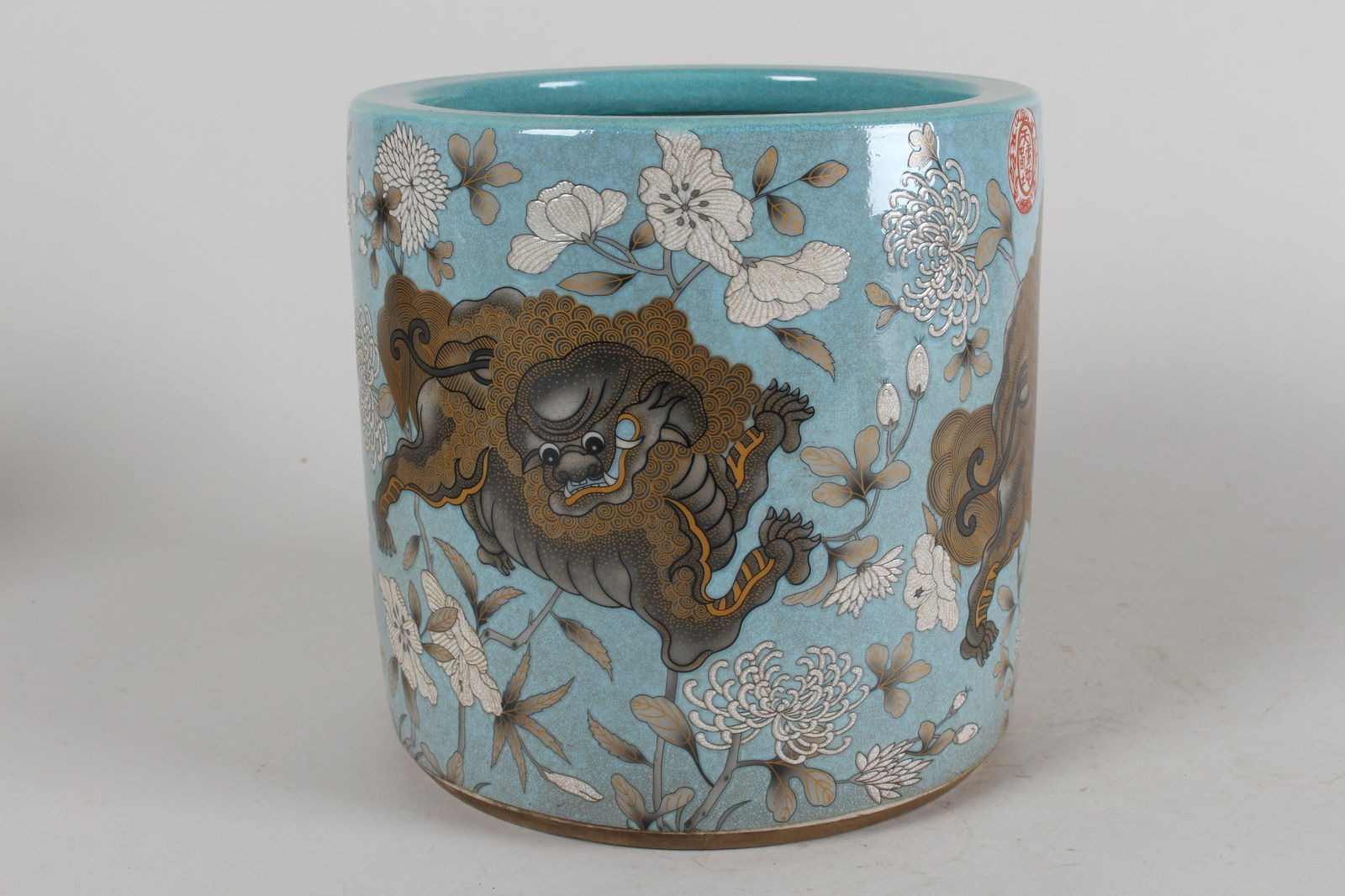 A Chinese Circular Myth-beast Fortune Porcelain Brush (1 of 5)