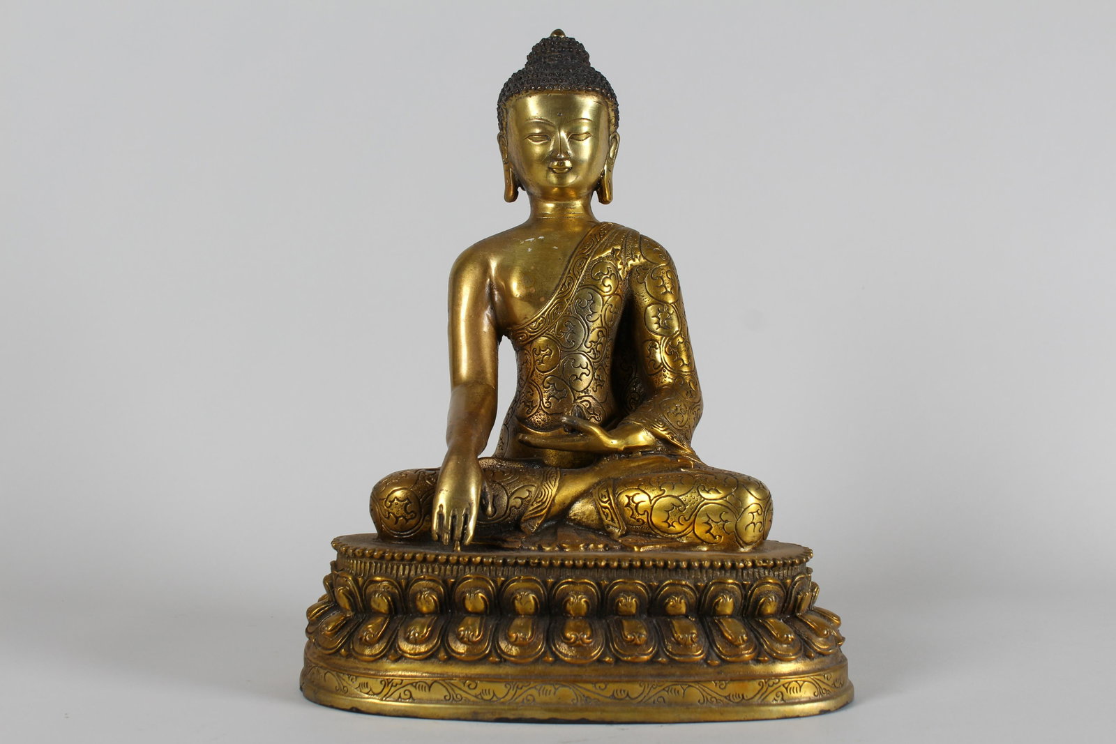 A Chinese Vividly-detailed Fortune Gilt Buddha Statue: A Chinese Vividly-detailed Fortune Gilt Buddha Statue . Height: 11 (inch).