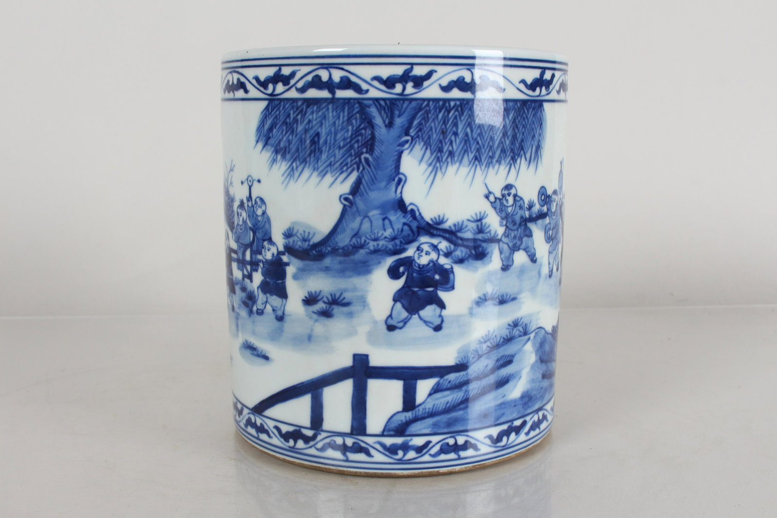 A Chinese Story-telling Detailed Blue and White: A Chinese Story-telling Detailed Blue and White Joyful-kid Porcelain Brush Pot. Height: 6 (inch). Opening Diameter: 5.25 (inch).