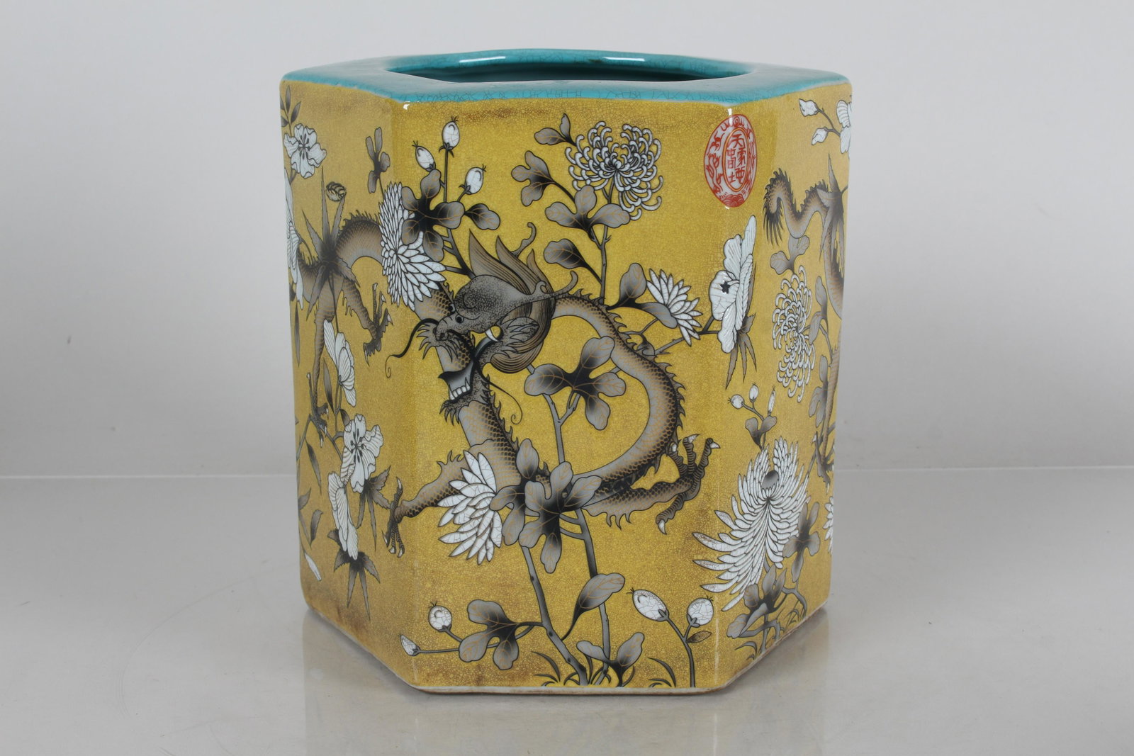A Chinese Hexa-fortune Dragon-decorating Porcelain: A Chinese Hexa-fortune Dragon-decorating Porcelain Fortune Brush Pot. Height: 7.75 (inch). Length: 7 (inch).