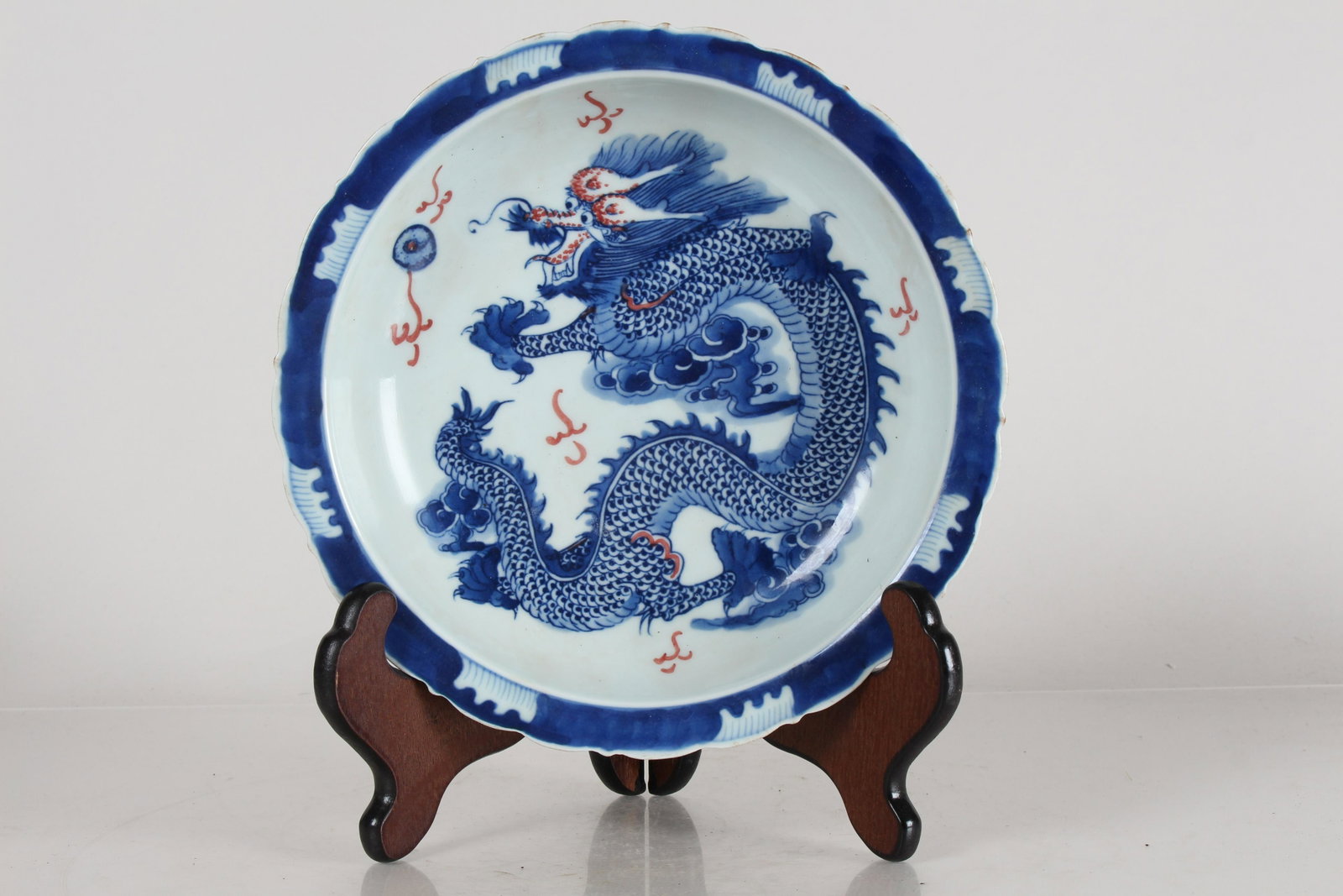 A Chinese Dragon-decorating Detailed Porcelain Fortune: A Chinese Dragon-decorating Detailed Porcelain Fortune Plate. Opening Diameter: 8.75 (inch).