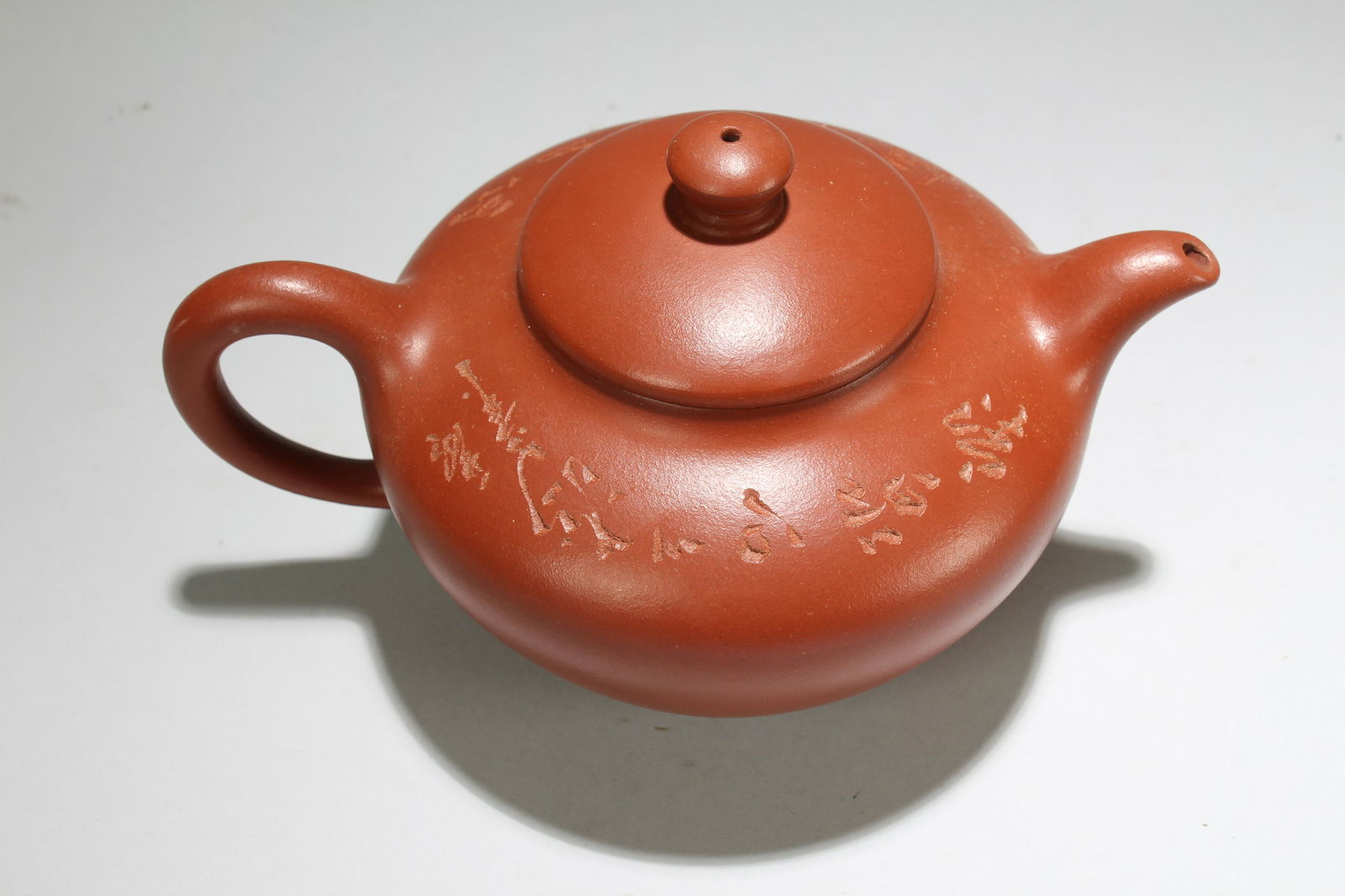 A Chinese Circular Lidded Fortune Tea Pot (1 of 4)