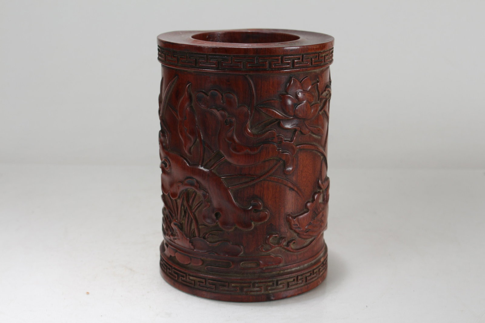 A Chinese Wooden Nature-sceen Fortune Brush Pot: A Chinese Wooden Nature-sceen Fortune Brush Pot. Height: 5.75 (inch). Opening Diameter: 4.25 (inch).