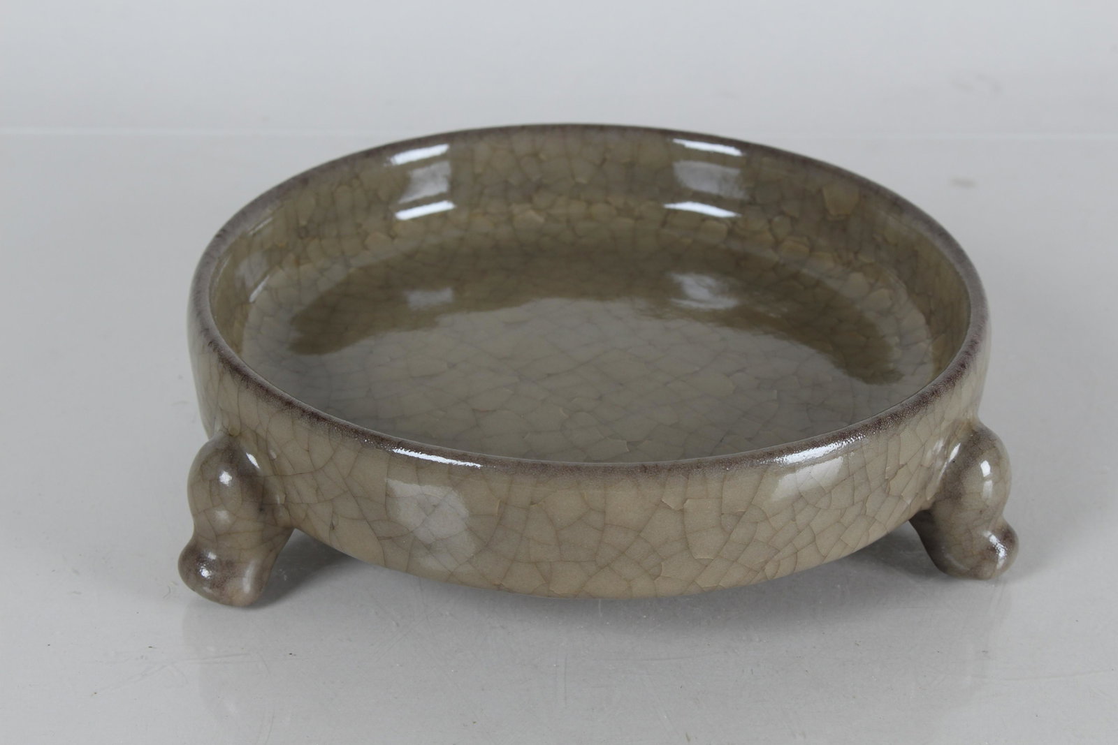 A Chinese Tri-podded Porcelain Fortune Censer: A Chinese Tri-podded Porcelain Fortune Censer . Height: 2 (inch). Opening Diameter: 7 (inch).