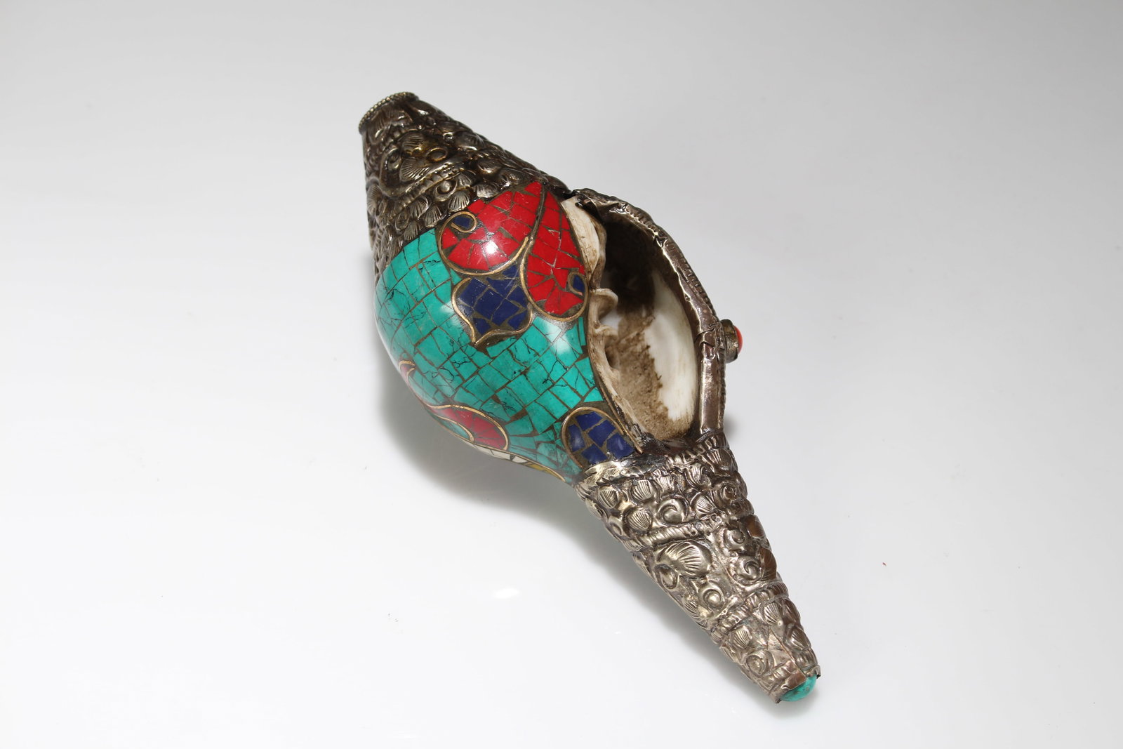 A Tibetan Religious Fortune Shell: A Tibetan Religious Fortune Shell. Length: 6 (inch).