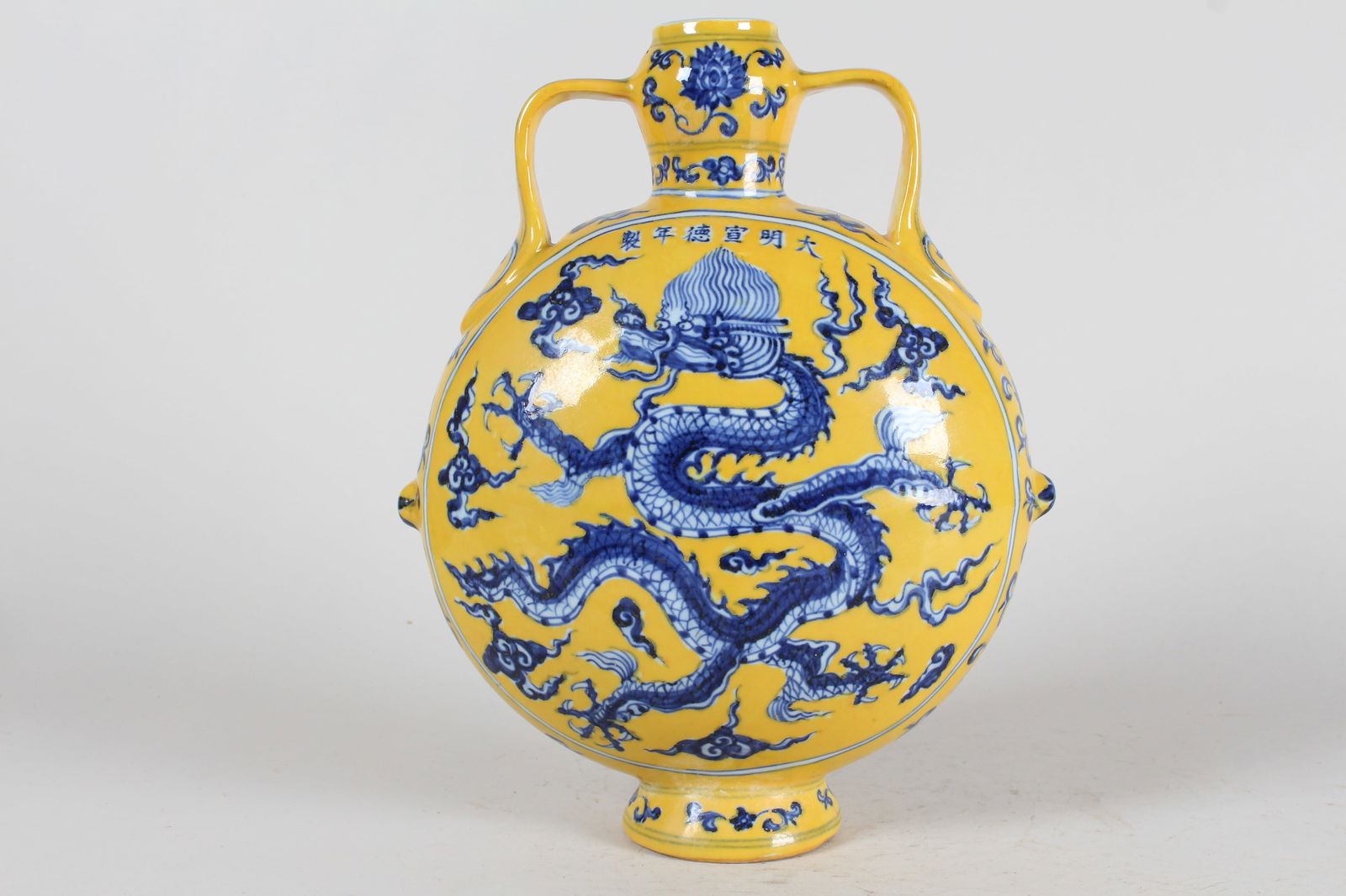 A Chinese Duo-handled Yellow-coding Dragon-decorating Fortune Porcelain Vase (1 of 4)