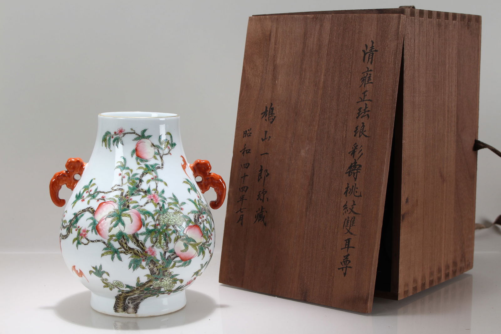 A Chinese Duo-handling Wooden-boxed Peach-fortune Porcelain Vase (1 of 5)