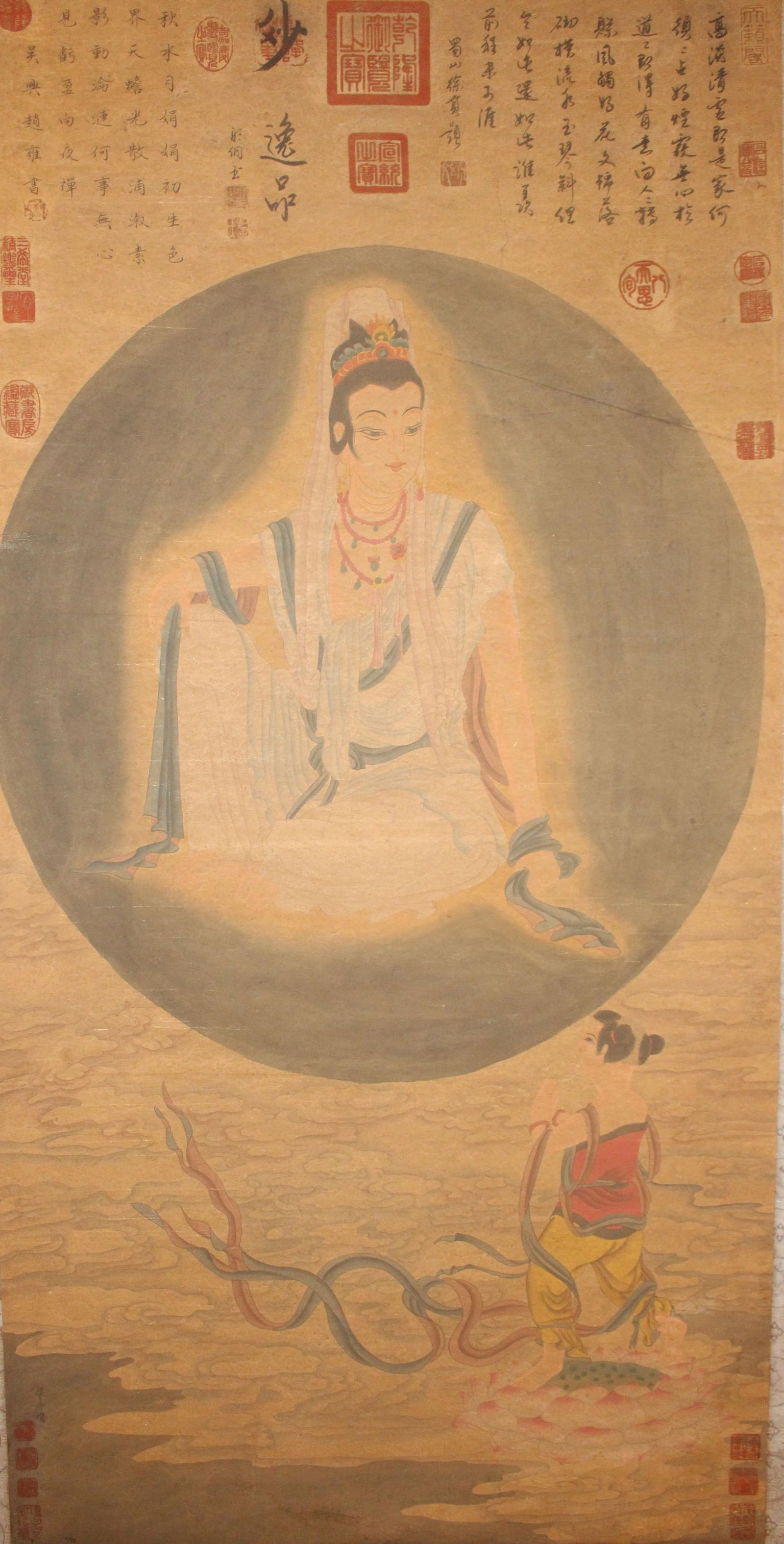 A Chinese Guanyin-portrait Poetry-framing Fortune Scroll: A Chinese Guanyin-portrait Poetry-framing Fortune Scroll. Length: 50(inch). Width: 25 (inch).