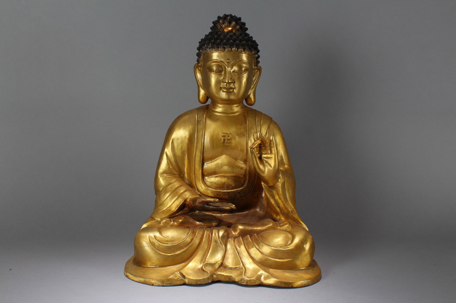 A Chinese Gilt Pondering-pouse Religious Fortune Massive Buddha Statue: A Chinese Gilt Pondering-pouse Religious Fortune Massive Buddha Statue. Height: 16 (inch). Width: 12 (inch). Length: 8 (inch).