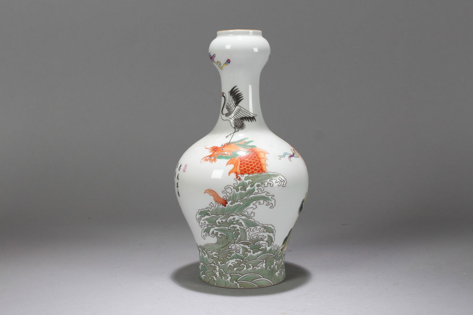 A Chinese Vividly-detailed Nature-sceen Dragon-decorating Porcelain Fortune Vase: A Chinese Vividly-detailed Nature-sceen Dragon-decorating Porcelain Fortune Vase. Height: 9 (inch). Width: 4.25 (inch).
