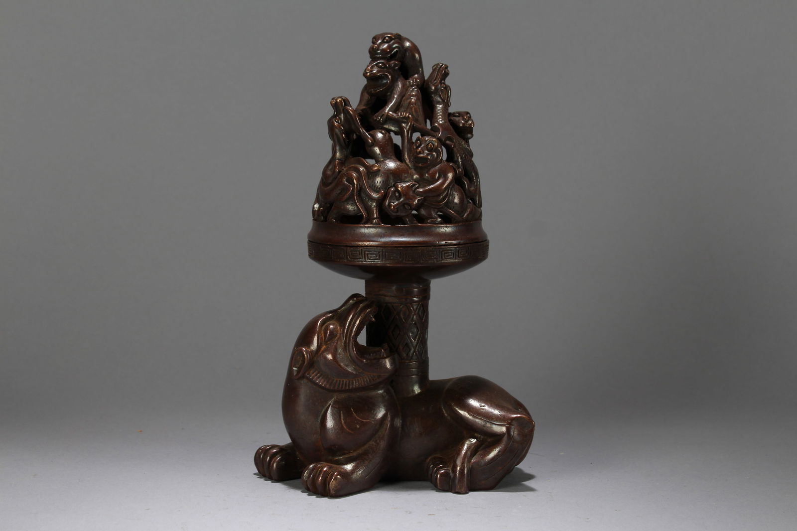 A Chinese Vividly-detailed Lidded Myth-beast Fortune Censer (1 of 7)