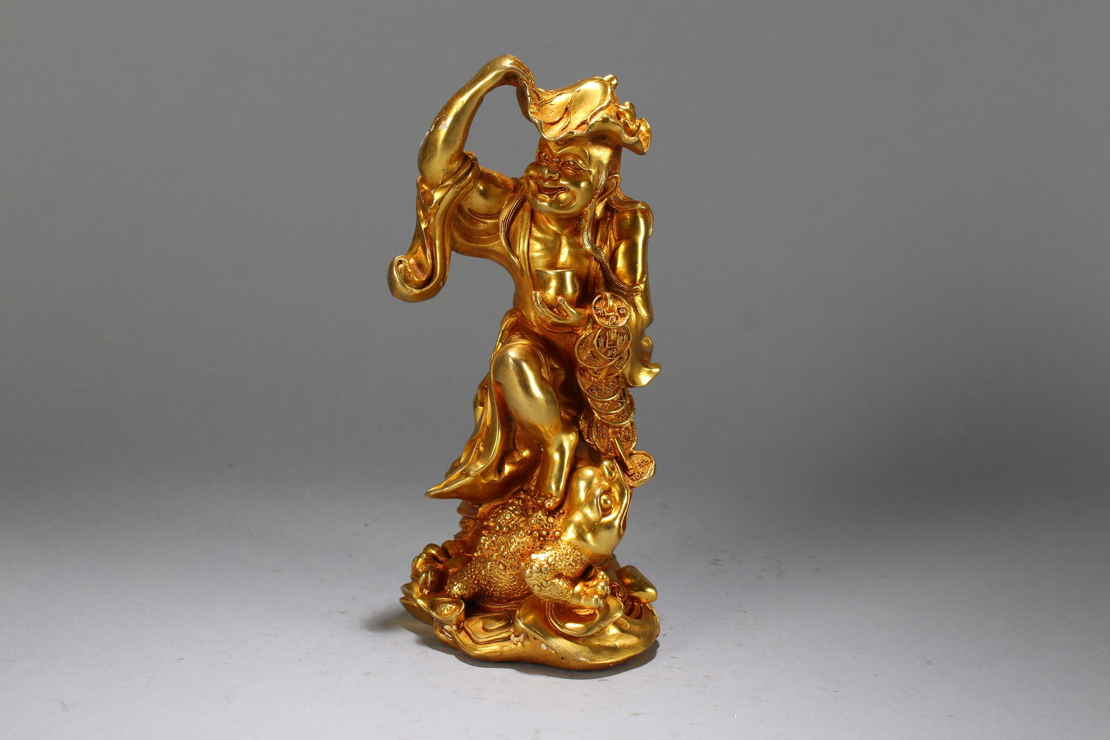 A Chinese Vividly-detailed Anicent-framing Gilt Buddha Statue: A Chinese Vividly-detailed Anicent-framing Gilt Buddha Statue. Height : 8 (inch). Width : 3.75 (inch). Length : 4 (inch).