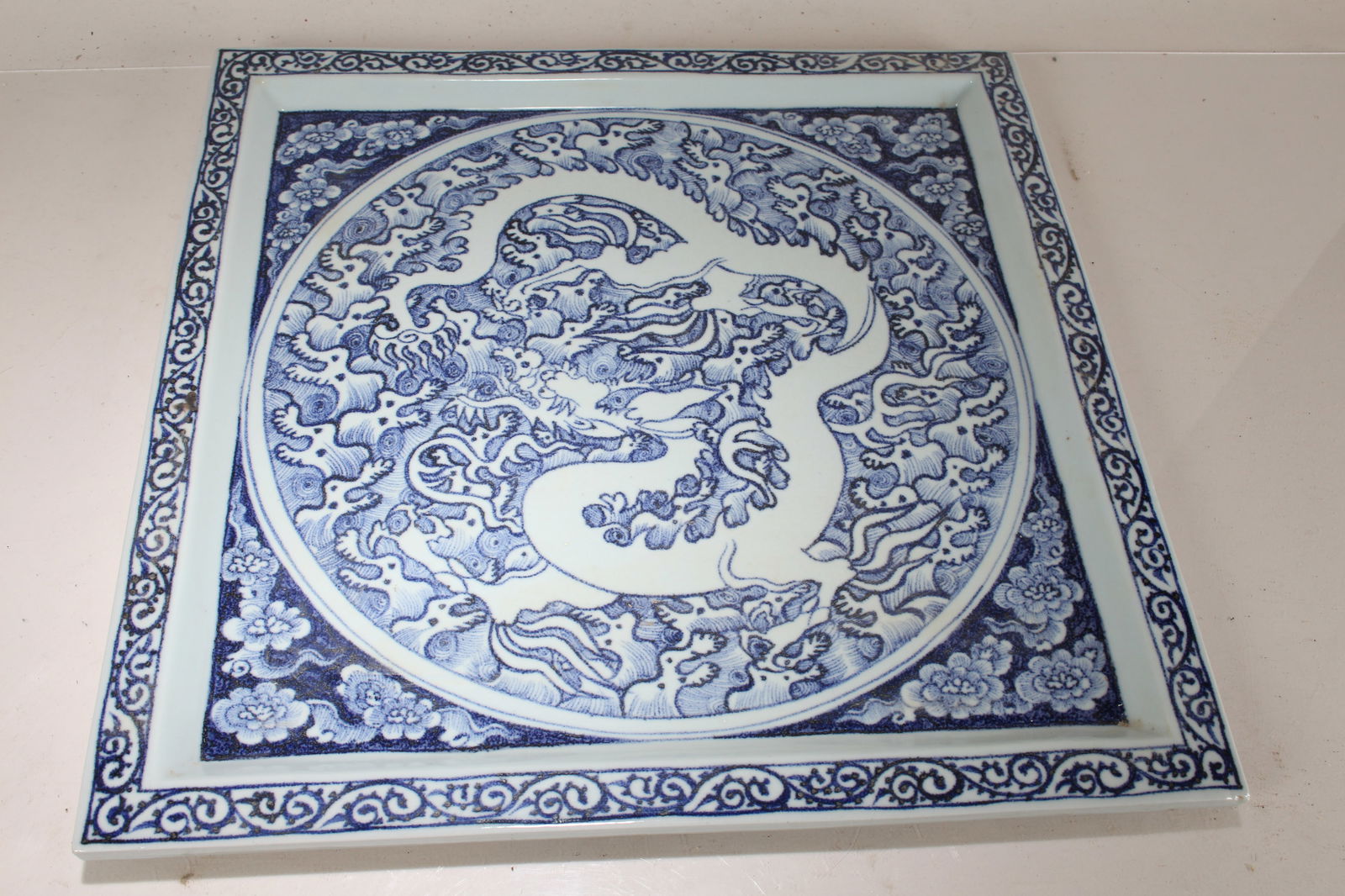 A Chinese Detailed Blue and White Square-based Porcelain Fortune Plate (1 of 4)