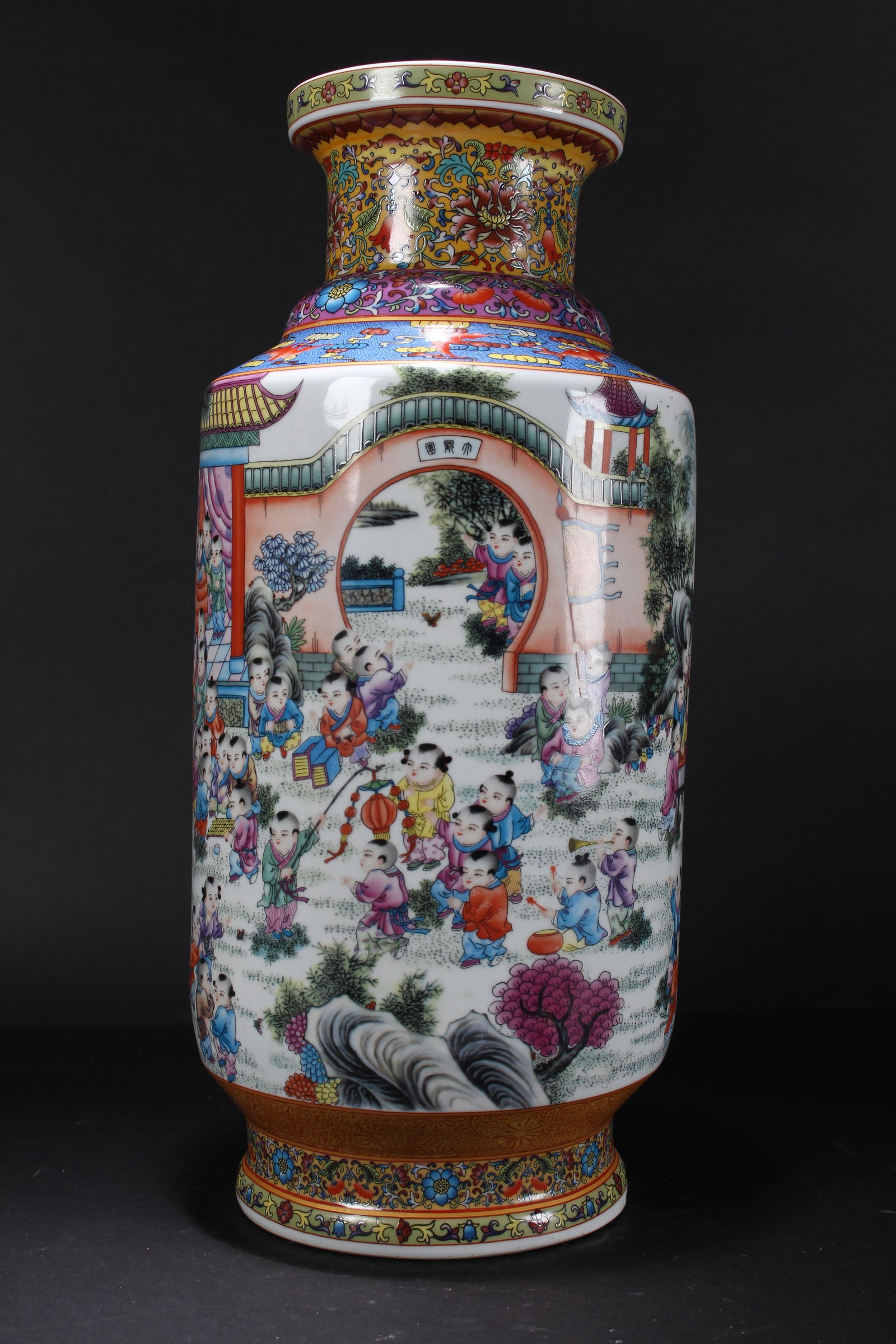 A Chinese Massive Joyful-kid Bat-framing Porcelain Fortune Vase: A Chinese Massive Joyful-kid Bat-framing Porcelain Fortune Vase. Height: 19.25 (inch). Opening Diameter: 5.75 (inch).