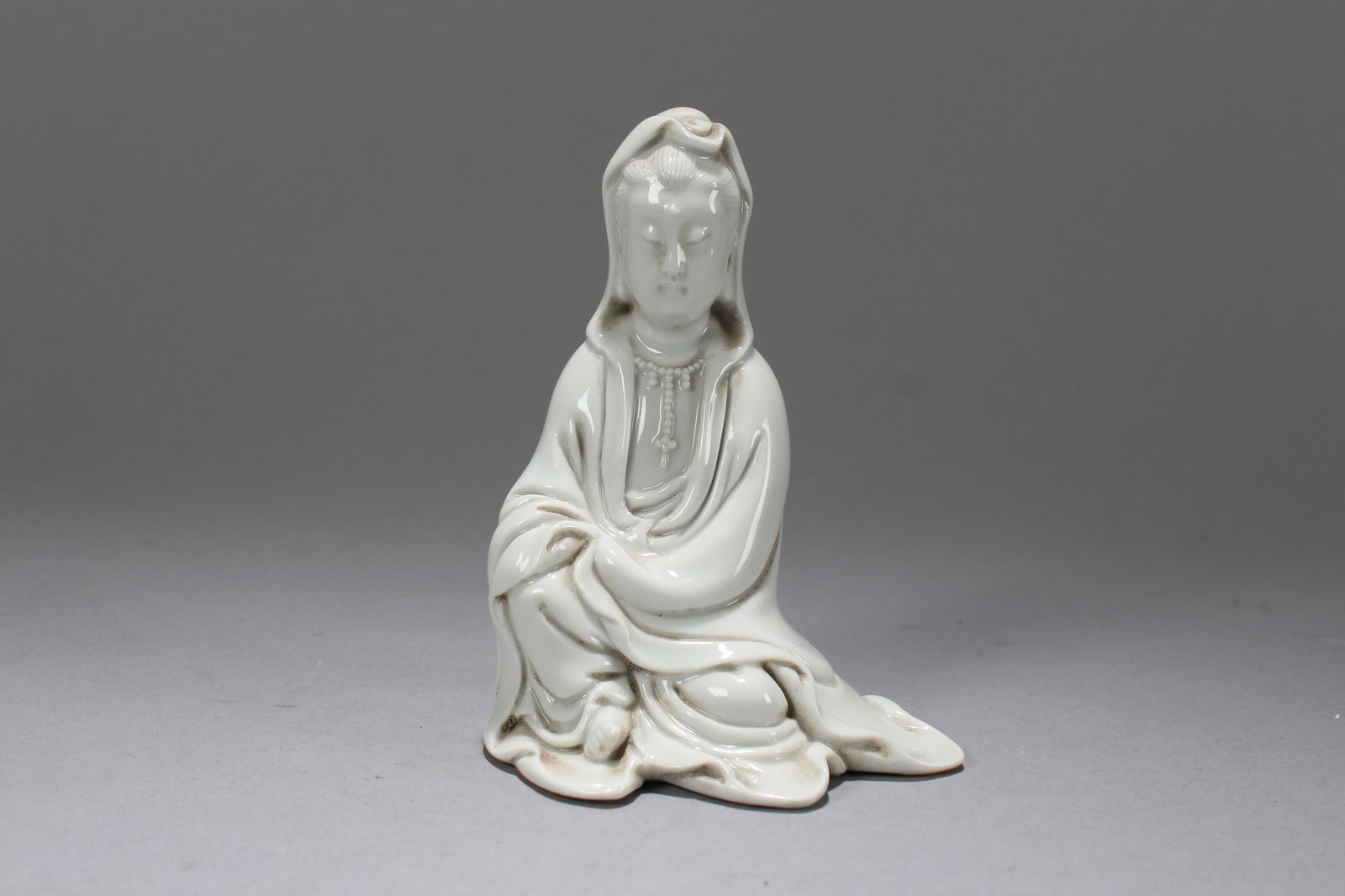 A Chinese De Blac Porcelain Fortune Guanyin Fortune Statue (1 of 5)