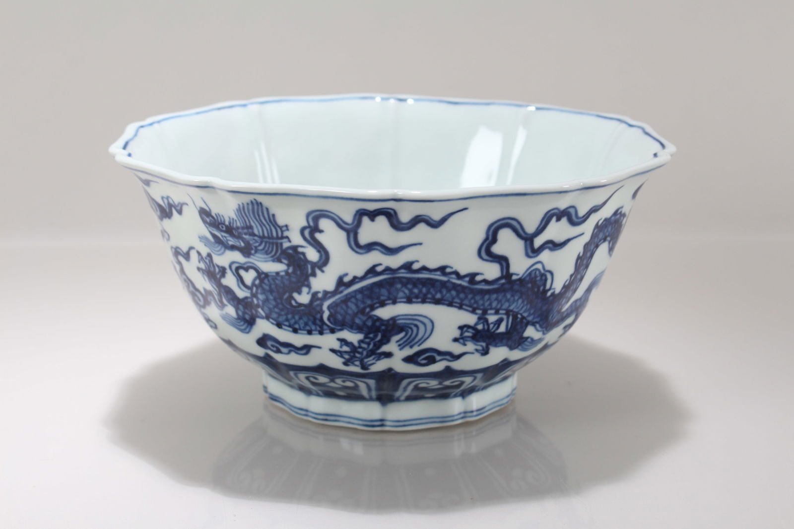 A Chinese Blue and White Porcelain Dragon-decorating Bowl (1 of 4)