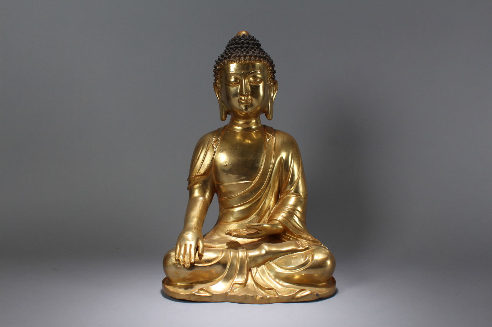A Chinese Religious Gilt Pondering-pose Fortune Buddha Statue: A Chinese Religious Gilt Pondering-pose Fortune Buddha Statue. Height: 17 (inch). Width: 10.5 (inch). Length: 8 (inch)
