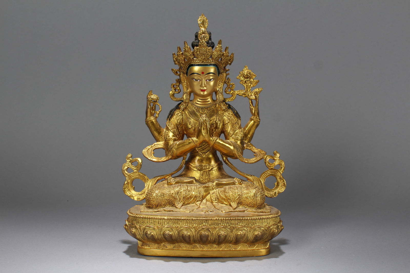 A Chinese Vividly-detailed Religious Gilt Fortune Buddha Statue: A Chinese Vividly-detailed Religious Gilt Fortune Buddha Statue. Height: 11.5 (inch). Length: 8 (inch). Width: 4.5 (inch).